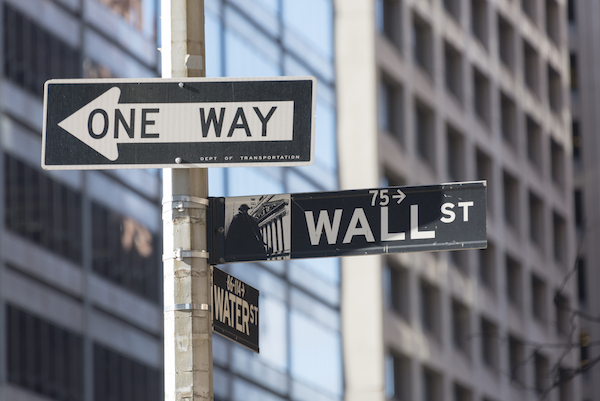 **FILE** New York city navigation: Wall street signboard with Water street and one way signboards fixed on a pole at a traffic intersection in New York city, USA. (Roberto Machado Noa/LightRocket via Getty Images)