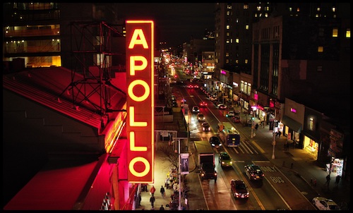 The famed Apollo Theater's neon sign shines over 125th Street in New York's Harlem neighborhood. (Courtesy of HBO via AFI Docs Film Festival)