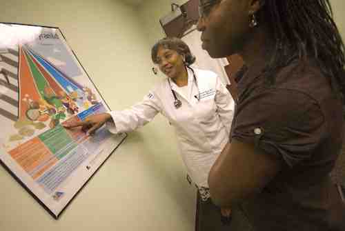 Dr. Gail Nunlee-Bland reviews nutrition with a patient at Howard University Hospital in a state-of-the-art facility that serves medical needs of diabetics. (Courtesy of HUHNews)