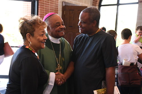 Archbishop Wilton D. Gregory greets congregants after Mass at St. Jane Frances de Chantal Church in Bethesda, Maryland, on July 28. (Roy Lewis/The Washington Informer)