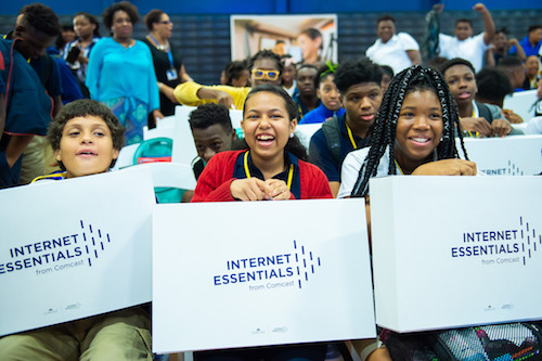 Students are surprised with free laptops from Comcast's Internet Essentials program. (Courtesy of Comcast internet Essentials)