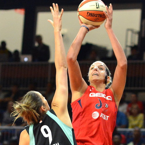 Washington Mystics forward Elena Delle Donne elevates to shoot over New York Liberty guard Rebecca Allen during the Mystics' 101-72 win at Entertainment and Sports Arena in D.C. on Sunday, Aug. 25. (John E. De Freitas/The Washington Informer)