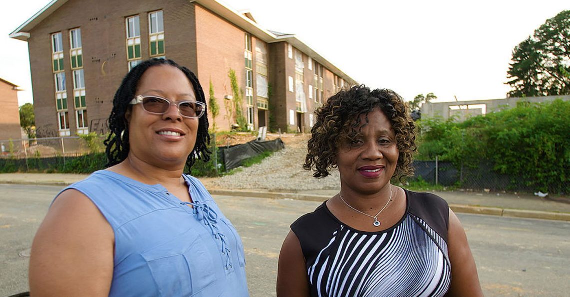 Cynthia Eaglin and Rufaro Jenkins in front of their former home at Parkway Overlook Apartments in Washington, D.C. (Courtesy of NNPA Newswire)