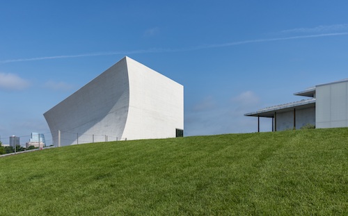 Skylight Pavilion features very large glass windows providing views of the Potomac River. The exterior wall facing the Center functions as a large projection screen for movies, simulcasts and more. (Jonathan Morefield/Kennedy Center)