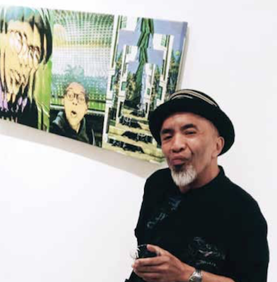 Artist Remy T with his photographic print, "Precious One," at the opening of "Just Do It: Friends of Michael Platt" at the Honfleur Gallery (Courtesy of BAMBAM)