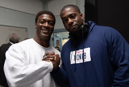 Actor Aldis Hodge (left) and Brian Banks on the set of Tom Shadyac’s “Brian Banks” (Courtesy of Forbes)