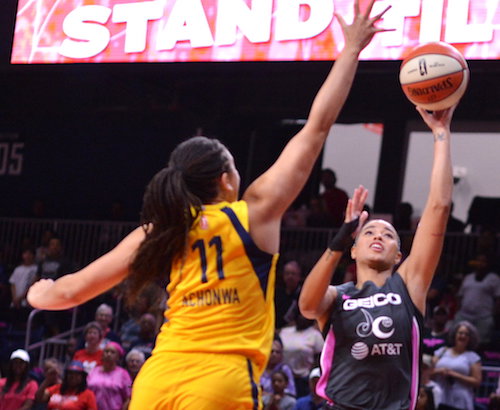 Washington Mystics guard Natasha Cloud shoots over Indiana Fever center Natalie Achonwa during the Mystics' 107-68 win at the Entertainment and Sports Arena in southeast D.C. on Aug. 18. (John E. De Freitas/The Washington Informer)