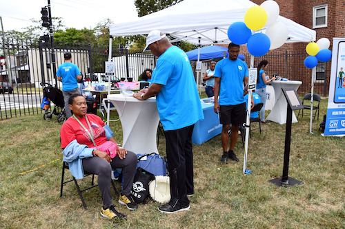 Ward 7 resident Renee Powell participates in a health screening during Community Day in Congress Heights on Sept. 14. (Anthony Tilghman/The Washington Informer)