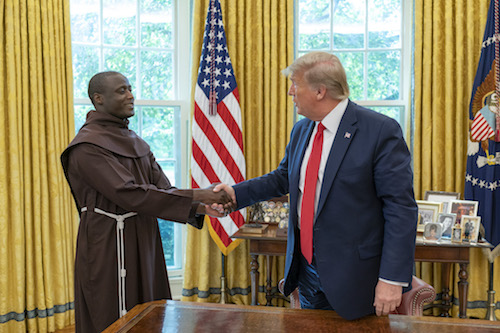 President Donald Trump greets Global Teacher Prize recipient Peter Tabichi of Kenya in the Oval Office of the White House on Sept. 16, 2019. (Official White House photo by Joyce N. Boghosian)