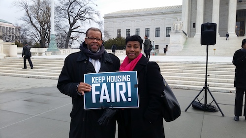 Keith Corbett and Nikitra Bailey of CRL with Fair Housing Sign after testifying on Capitol Hill