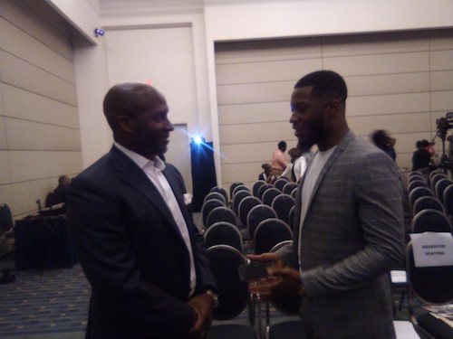 Thomas Penny III talks with mentee Arturo Evans at the My Brother's Keeper Summit & Volunteer Fair at the Walter E. Washington Convention Center in Northwest on Sept. 5. (James Wright/The Washington Informer)