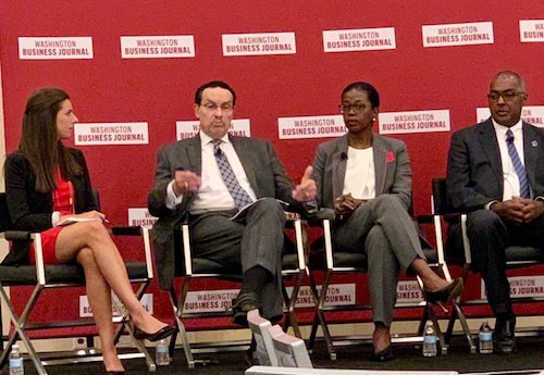 D.C. Councilman Vincent Gray (second from left) speaks while (from left) Washington Business Journal reporter Sara Gilgore, Dr. Tamarah Duperval-Brownlee, Dr. Hugh Mighty and Wayne Turnage listen at a Sept. 6 panel discussion on hospital services in the District at the Renaissance Arlington Capital View Hotel in Arlington, Va.