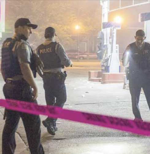Police officers assess the damage from a recent mass shooting in Texas. (Courtesy photo)