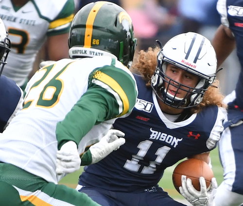 Howard Bison wide receiver Jordan Aley attempts to evade Norfolk State Spartans defensive back Rashard Russell Jr. during Norfolk State's 49-21 win at Greene Stadium in northwest D.C. on Oct. 12. (John E. De Freitas/The Washington Informer)