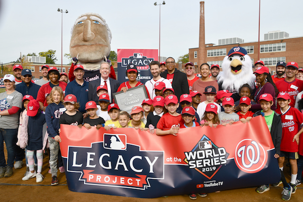 Mayor Muriel Bowser, D.C. Council member Charles Allen (Ward 6), and Lewis D. Ferebee, chancellor of DC Public Schools, join MLB and the Washington Nationals at Payne Elementary School in partnership with Capitol Hill Little League (CHLL), Oct. 25. School activities include netting upkeep, debris removal, and cosmetic repairs. (Anthony Tilghman/The Washington Informer)