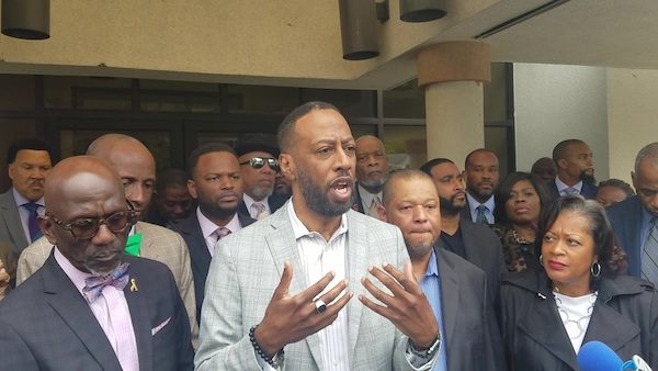 The Rev. Tony Lee speaks outside Prince George's County Police Department headquarters in Palmer Park to support police Chief Hank Stawinski and other police officers. (William J. Ford/The Washington Informer)