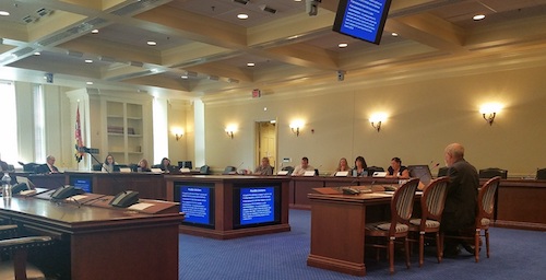 Daniel Saunders (right) speaks in Annapolis on Oct. 1 before a Maryland work group asked to provide recommendations on improving child custody court proceedings. (William J. Ford/The Washington Informer)