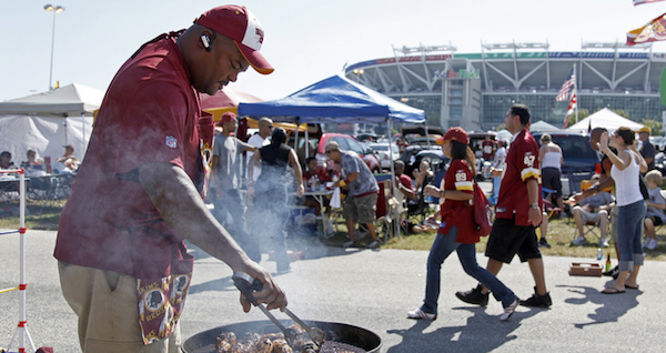 Fans cooking up something good during a tailgate party at FedEx Field before a Redskins game (Courtesy of American Eagle Limo)