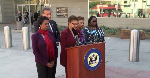 Members of the Congressional Black Caucus, Rep. Karen Bass (D-CA) (center), Rep. Barbara Lee (D-CA) (fourth from left), and Congresswoman Yvette Clarke (D-NY) (far left), along with local Congressman, Rep. Juan Vargas (second from left), visited a shelter for African asylum-seekers in Tijuana November 22, 2019. Attorney Nana Gyamfi, the executive director of the Black Alliance for Just Immigration (far right), joined the group at the border. (Screen capture KPBS/YouTube via NNPA Newswire)