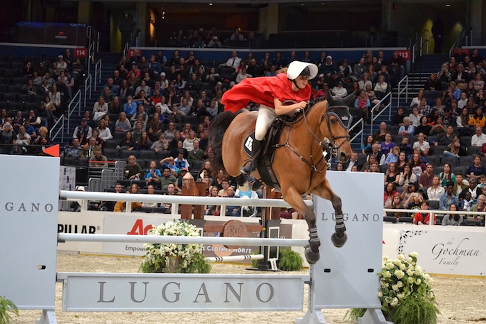 Adrienne Sternlicht (USA), dressed as Little Red Riding Hood, and horse Cristalline finished in second place in the $36,000 Accumulator Costume class of the Washington International Horse Show, presented by MARS Equestrian, at Capital One Arena in D.C. on Oct. 24. (Brigette Squire/The Washington Informer)