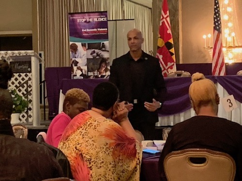 Michael A. Jones explains to the audience why they need to be alert about their surroundings during a safety, security and awareness presentation at the Sacred Spaces Interfaith Symposium at Martin's Crosswinds in Greenbelt, Md., on Oct. 26.  