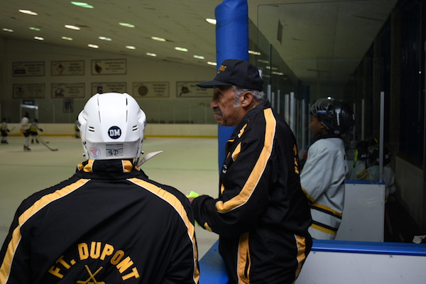 Neal Henderson, a lifelong hockey player and recent U.S. Hockey Hall of Fame inductee, coaches young ice skaters at the Fort Dupont Ice Hockey Club in southeast D.C. (Anthony Tilghman/The Washington Informer)