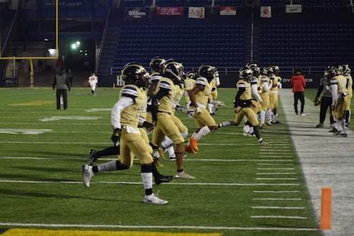 The Potomac High School football team warms up Dec. 7 before Maryland 2A state championship game in Annapolis. (Courtesy of Potomac High School)