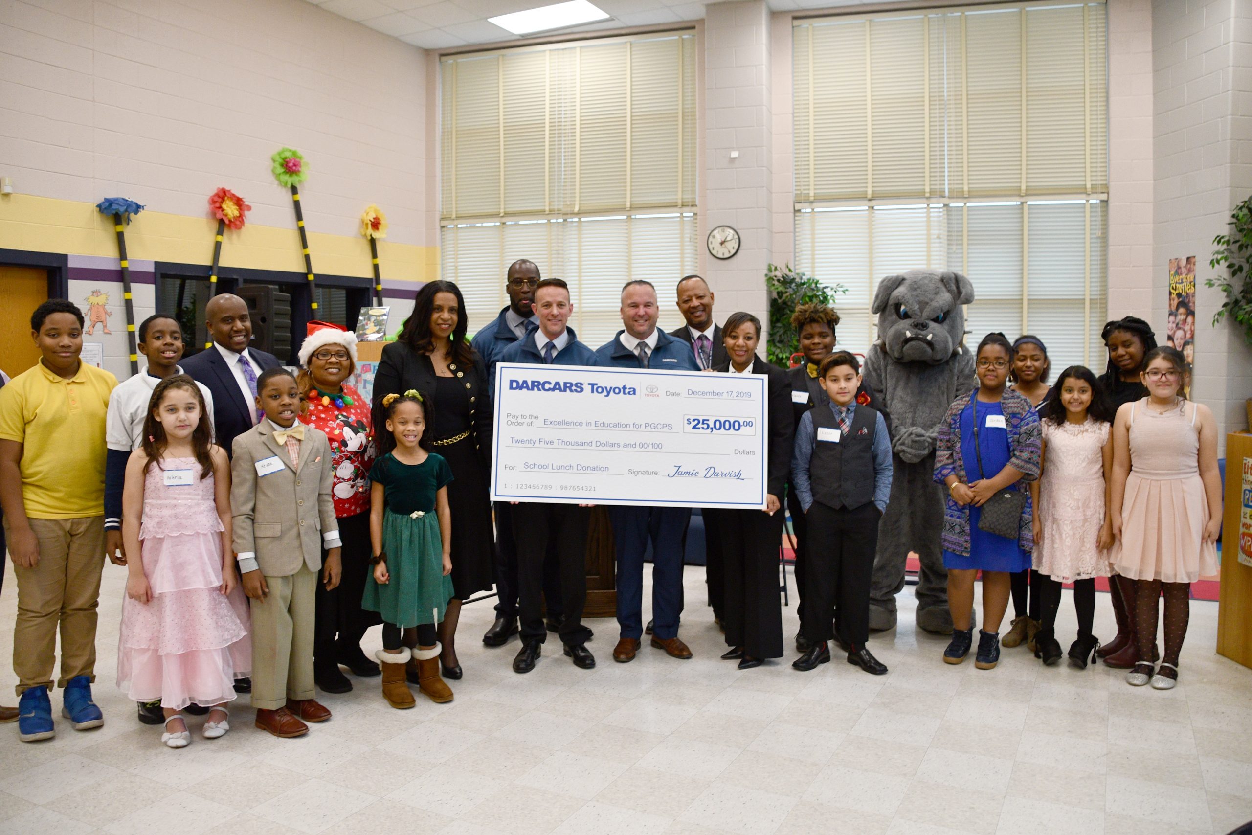 DARCARS Automotive Group recently spread some holiday cheer by paying off school lunch debt for PGCPS students. (Anthony Tilghman/The Washington Informer)