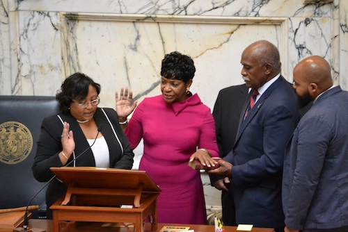 Del. Adrienne Jones (center) is officially sworn in as Maryland House speaker on Jan. 8. She is the first Black lawmaker and first woman to hold the position. (Brigette Squire/The Washington Informer)