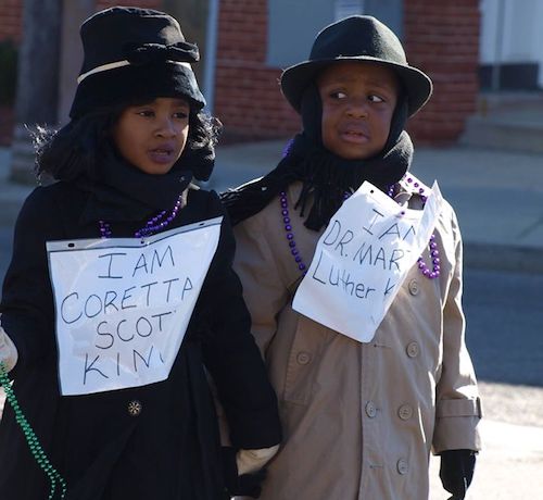 Martin Luther King Jr. and his wife Coretta were celebrated by young and old alike during the 2016 MLK Peace Walk & Parade. (Shantella Y. Sherman/The Washington Informer)