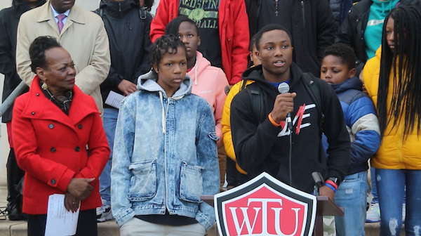 D.C. tudents gathered on the steps of Anacostia High School on Jan. 16 to urge Mayor Muriel Bowser to fund violence prevention endeavors in schools throughout the city. (Shevry Lassiter/The Washington Informer)