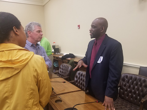 Llauris Rener (right), creative director for Largo. Maryland-based 710Squared, participates in Legislative Education Day hosted by The Cannabis Patient Advocacy Association in Annapolis on Feb. 6. (William J. Ford/The Washington Informer)