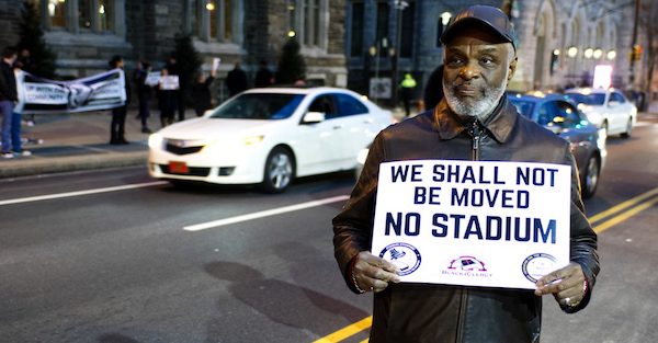**FILE** Community members, activists and students protest the then proposed $130 million, 30,000-seat stadium on Temple University’s campus in north Philadelphia. (iStockphoto via NNPA Newswire)
