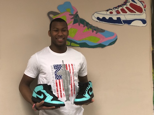 Derrick Griffin, a senior at Chesapeake Math and IT Academy, loves art and painting, head to toe, and as an entrepreneur, customizes his own sneakers. (PGCPS photo)
