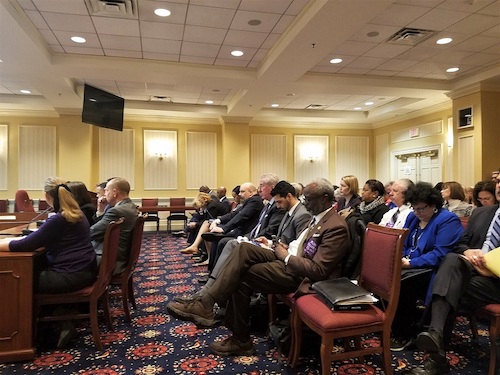 Lawmakers listen to testimony in Annapolis on Feb. 27 regarding proposed legislation for employers to offer paid family leave. (William J. Ford/The Washington Informer)