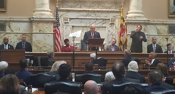 Maryland Gov. Larry Hogan (center) gives his sixth State of the State address in the House of Delegates chamber in Annapolis on Feb. 5. House Speaker Adrienne Jones (left) and Senate President Bill Ferguson sit at the dais to listen. (William J. Ford/The Washington Informer)