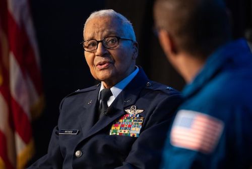 Retired Air Force honorary Brig. Gen. Charles McGee speaks with NASA astronaut Alvin Drew at NASA's D.C. headquarters during a Black History Month program, "Trailblazers: The Story of a Tuskegee Airman," on Feb. 5. (Joel Kowsky/NASA)