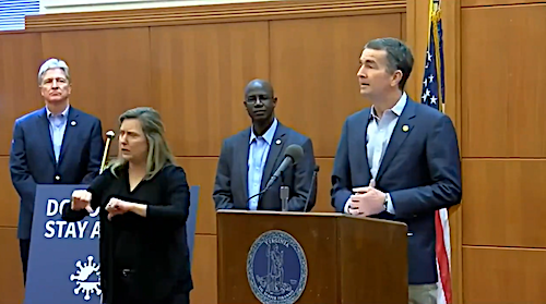 Virginia Gov. Ralph Northam holds a press conference on March 30 to announce a statewide stay-at-home order amid the global coronavirus pandemic.