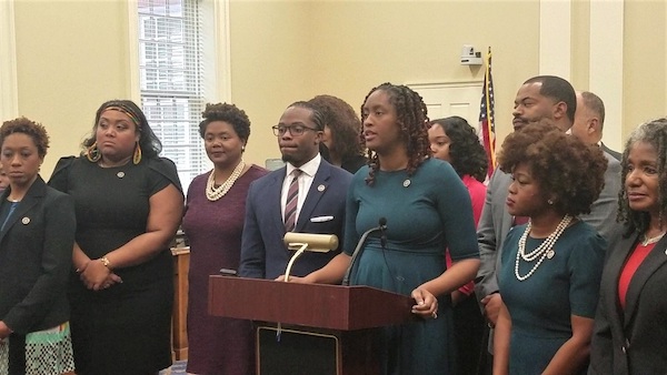 Del. Stephanie Smith (center) leads a March 6 press conference in Annapolis on proposed legislation to restrict discrimination in the workplace based on a person's hair. (William J. Ford/The Washington Informer)