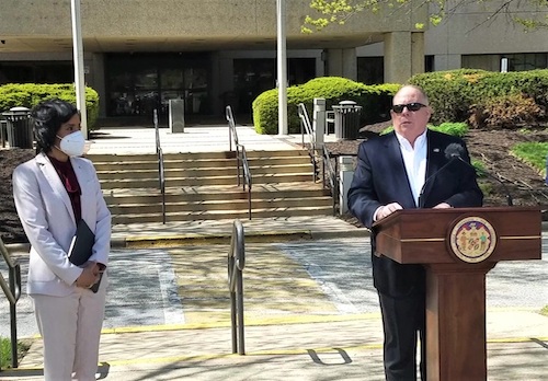 Maryland Gov. Larry Hogan speaks during an April 22 press conference outside Laurel Medical Center to announce the facility will reopen to treat coronavirus patients as Prince George's County Executive Angela Alsobrooks looks on. (William J. Ford/The Washington Informer)