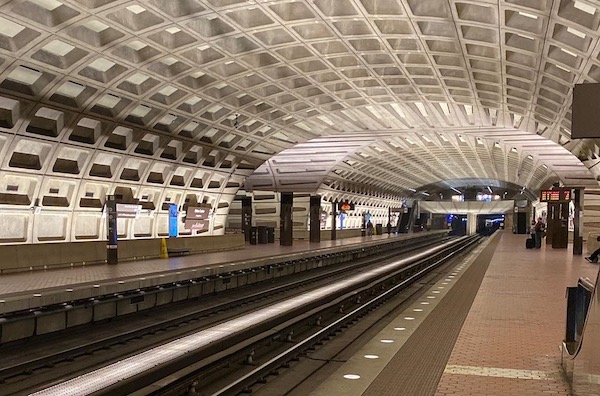 The busiest subway stop at Metro Center was nearly empty during what would have been rush hours as patrons from Maryland and Virginia heeded stay-at-home orders issued by the governors of those states and the order for District of Columbia residents went in effect at midnight on Tuesday. (Anthony Tilghman/The Washington Informer)
