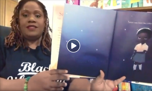 K.C. Boyd, a library media specialist for D.C. Public School, reads aloud Lupita Nyong'o’s "Sulwe" on the Washington Teachers' Union streaming resource, "Learning Doesn't Stop: Lessons on TV."