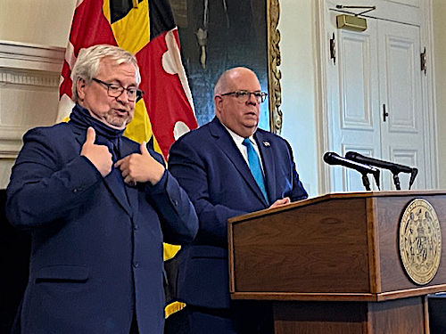 Maryland Gov. Larry Hogan (right) speaks during a May 13 press conference in Annapolis to announce his lifting of a statewide stay-at-home order amid the coronavirus pandemic. (William J. Ford/The Washington Informer)