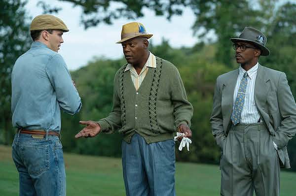 Samuel L. Jackson (center) leads a star-studded cast in "The Banker." (Courtesy of Apple TV)