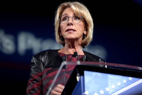 Education Secretary Betsy DeVos has rolled back civil rights protections for college students filing complaints of sexual harassment or assault. (Courtesy of globalcitizen.com)
