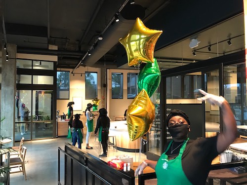 Baristas and staffers welcome customers to the new Starbucks in the Anacostia neighborhood of southeast D.C. (John Muller/Special to The Informer)
