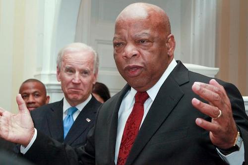 **FILE** Rep. John Lewis with former Vice President Joe Biden at a Black History event during the Obama administration. (Shevry Lassiter/The Washington Informer)