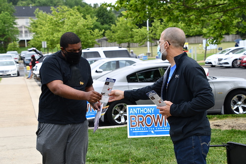 Rep. Anthony G. Brown greets a voter at the polls on June 2, the day of the primary election day in Maryland. (Anthony Tilghman/The Washington Informer)