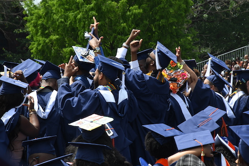 **FILE** Howard University graduates celebrate during the 2019 commencement ceremony. (Roy Lewis/The Washington Informer)
