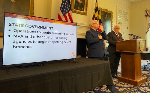 Maryland Gov. Larry Hogan (right) speaks during a June 3 press conference in Annapolis to announce that the state will allow nonessential businesses to reopen this week amid the coronavirus pandemic. (William J. Ford/The Washington Informer)